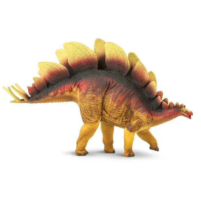 Colorful plastic toy model of a Stegosaurus dinosaur.