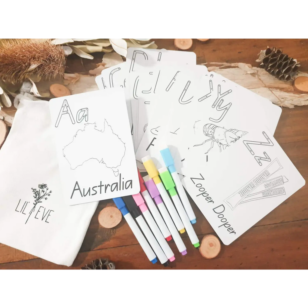 Coloring pages featuring Australian-themed drawings alongside colorful markers.