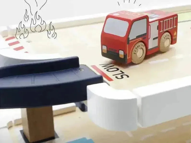 Red wooden toy fire truck.