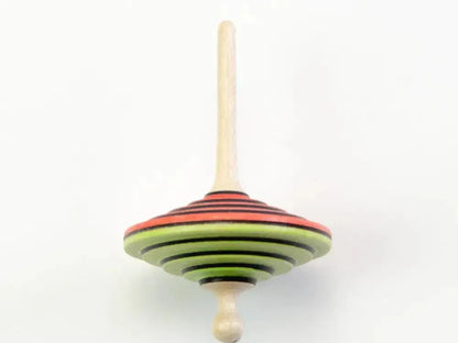 Colorful wooden spinning top with red, green, and black stripes.