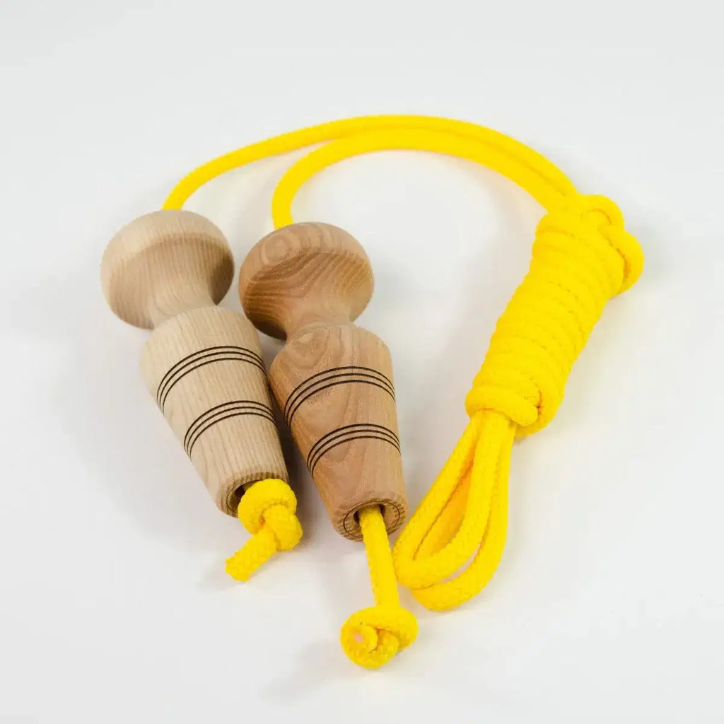 Yellow jump rope with wooden handles.