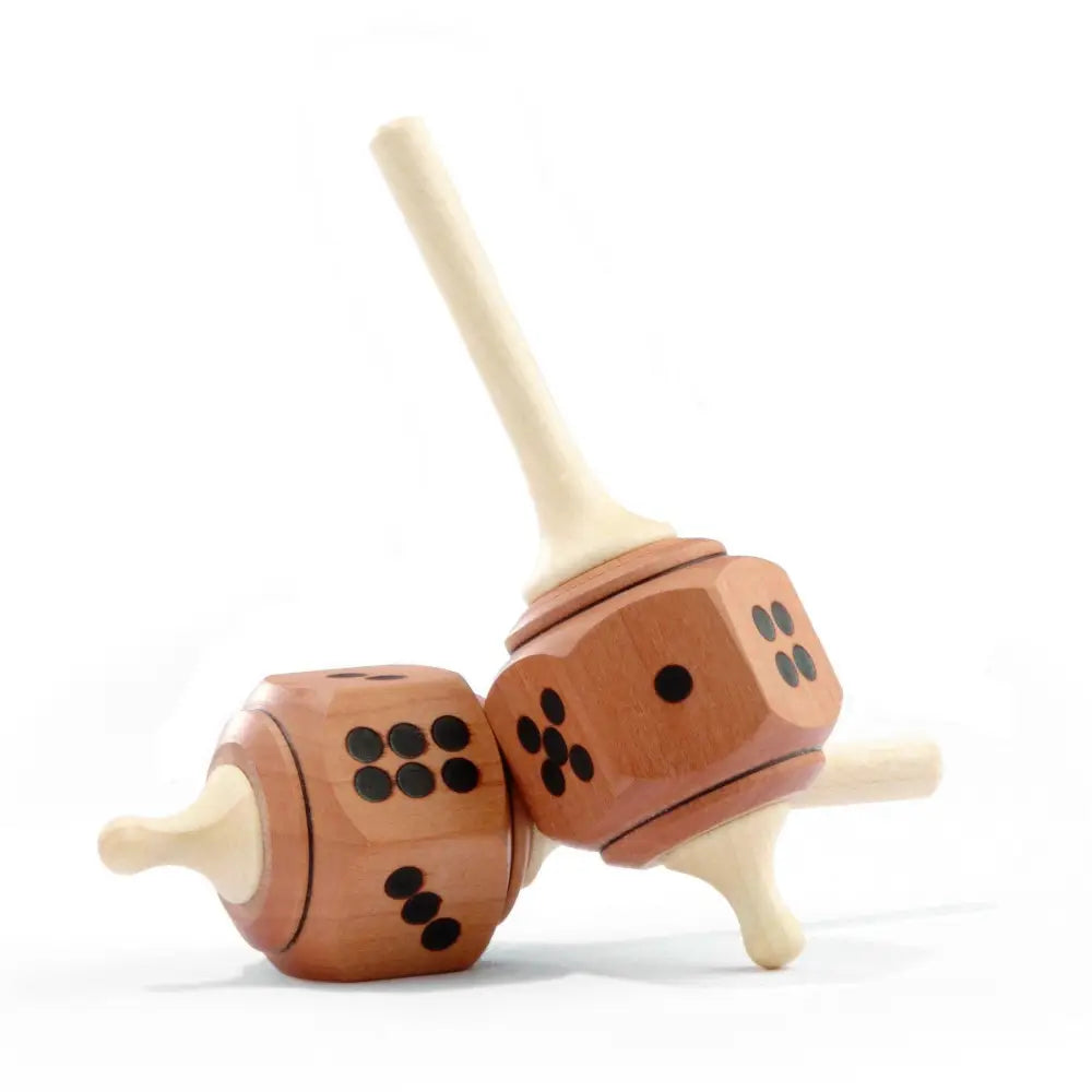 Wooden toy dog with dice-shaped body segments and stick legs.