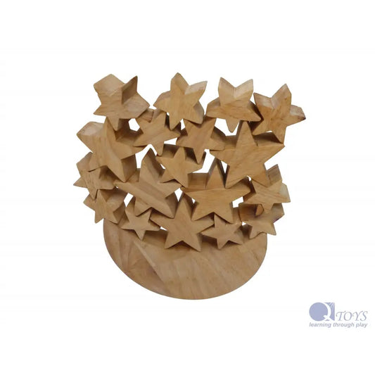 Wooden sculpture featuring multiple star shapes arranged in a cluster.