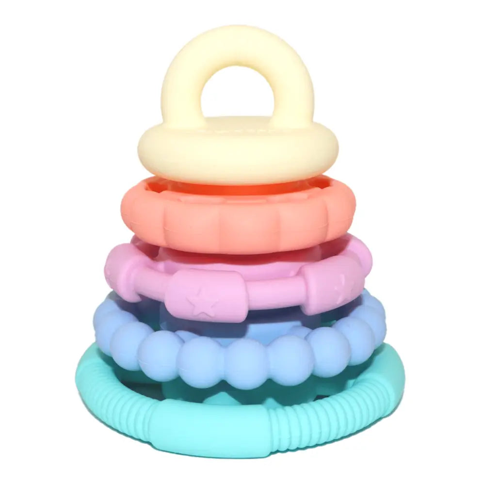 Colorful stacking toy with pastel-hued rings and a teething ring on top.
