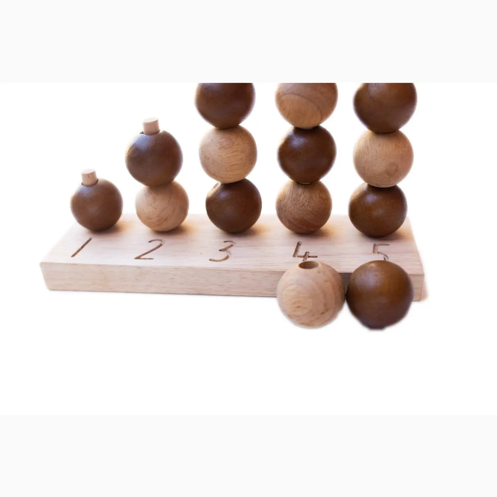 Wooden counting toy with alternating colored beads.