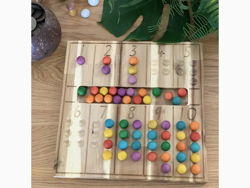 Wooden counting board with colorful beads.