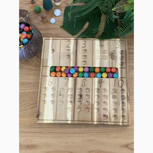 Wooden counting board with colorful beads.