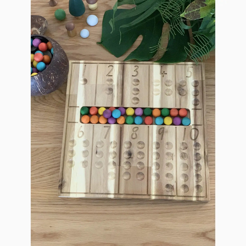 Wooden counting board with colorful beads.