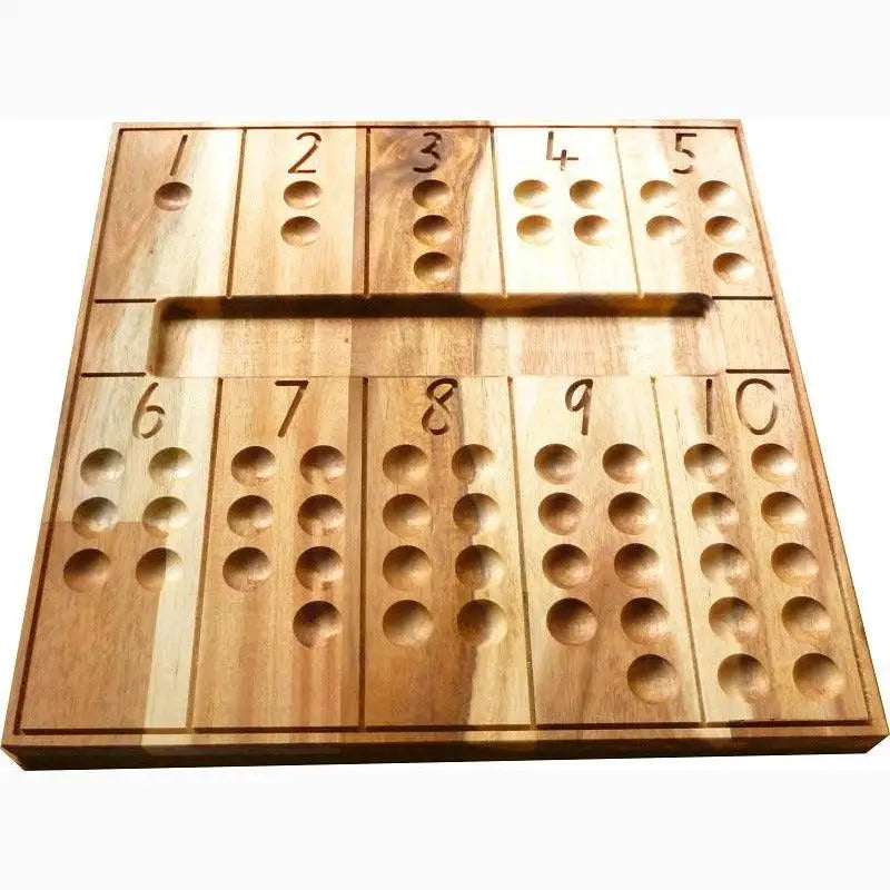 Wooden counting board with numbered sections and recessed holes.