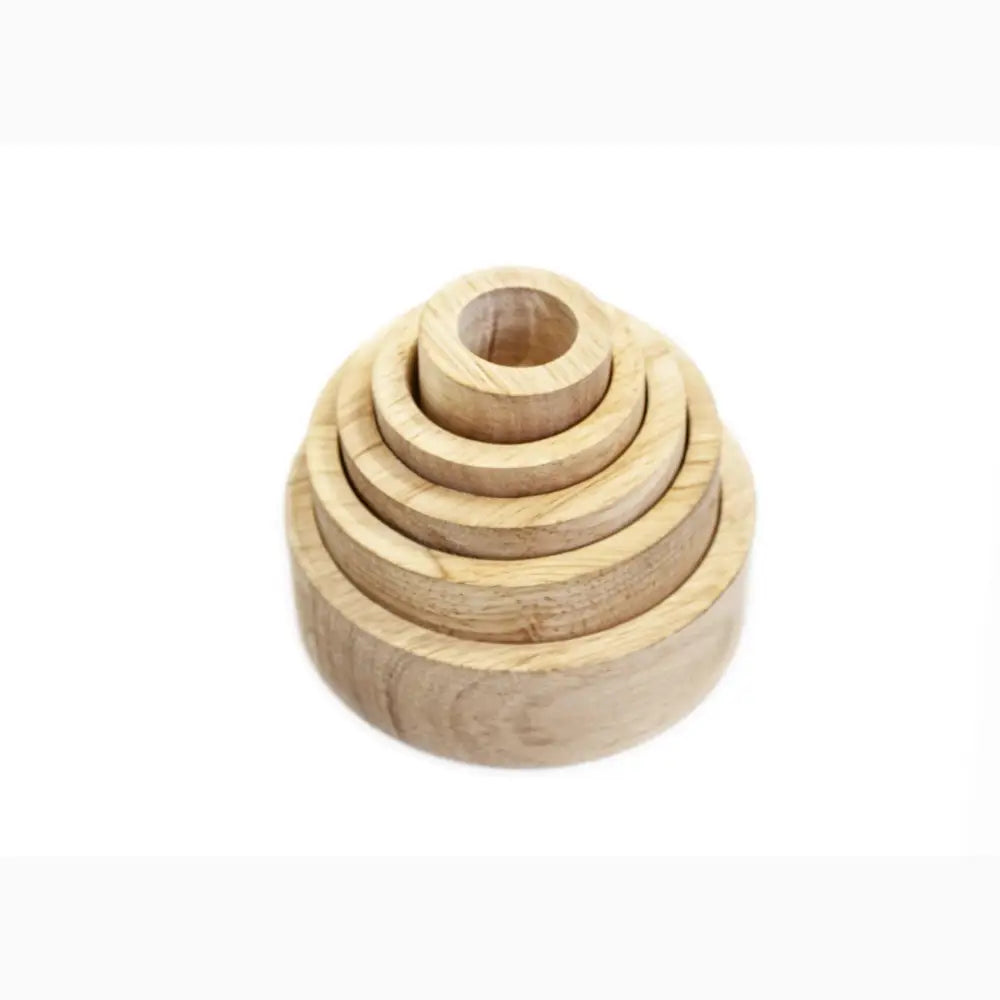 Wooden stacking toy with concentric circular pieces of decreasing size.