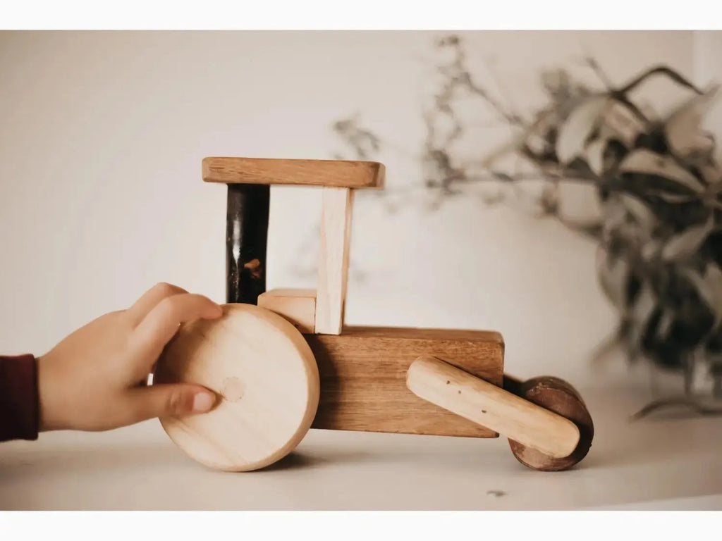 Wooden toy tractor.