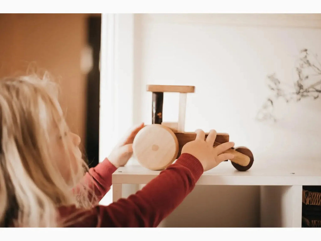 Wooden toy tractor.