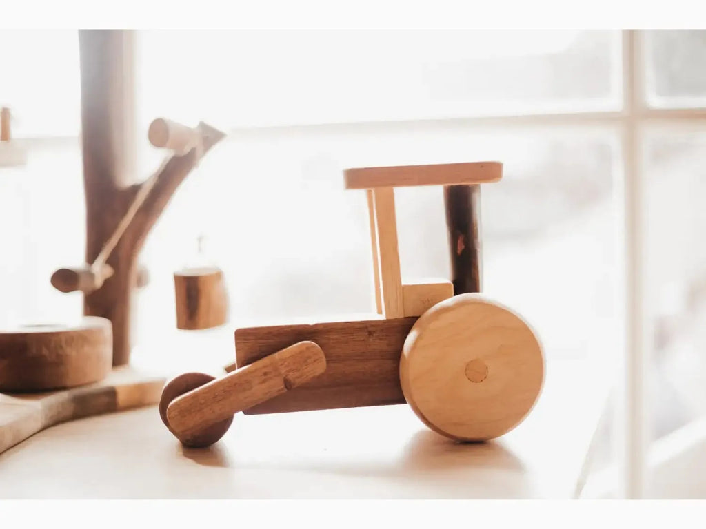 Wooden toy tractor.