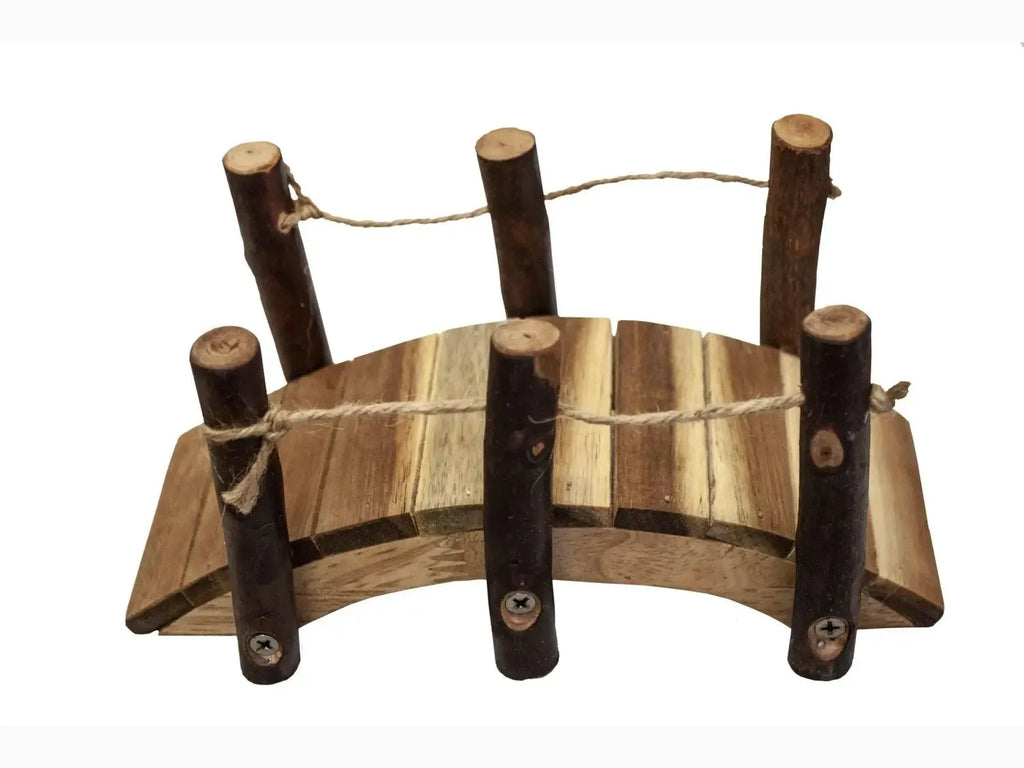 Rustic wooden footbridge or garden ornament with curved planks and vertical posts.