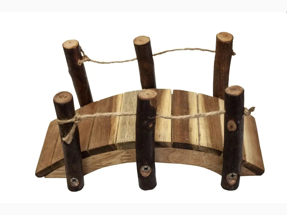 Rustic wooden footbridge or garden ornament with curved planks and vertical posts.