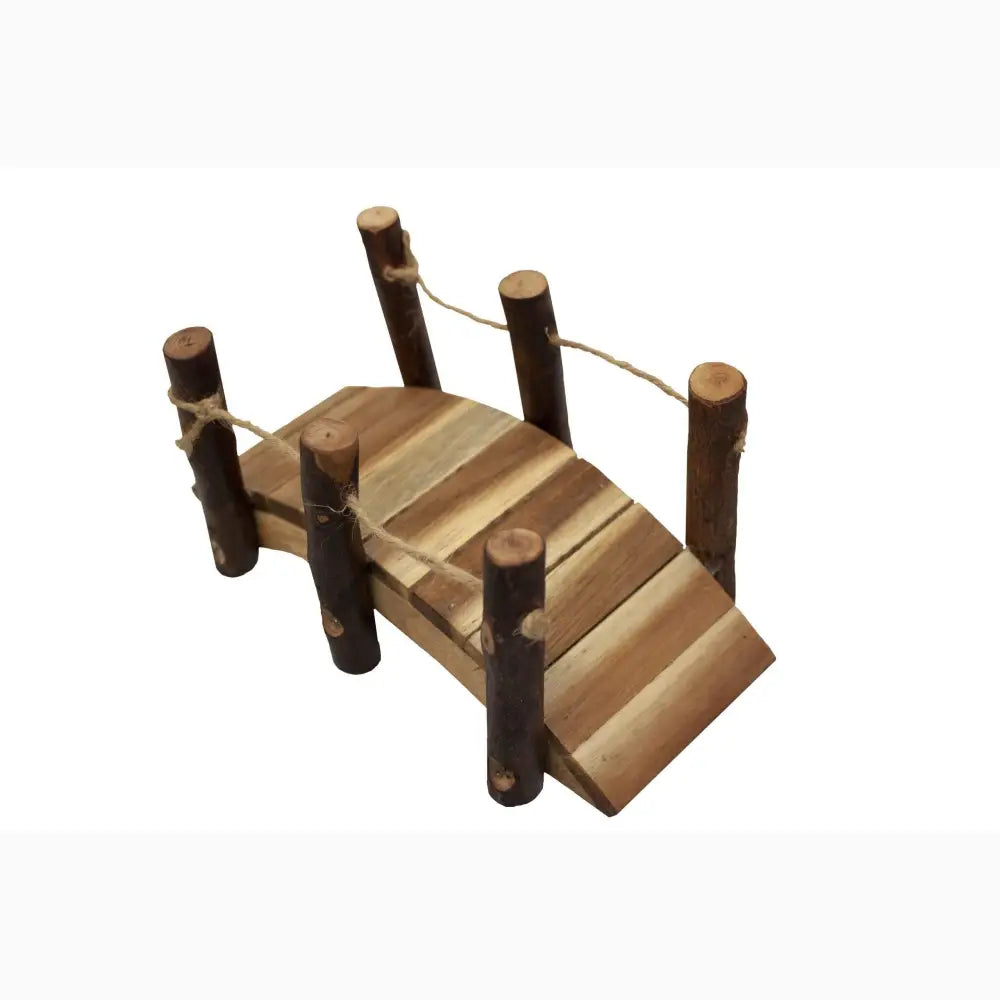 Wooden miniature bridge with arched planks and vertical posts.