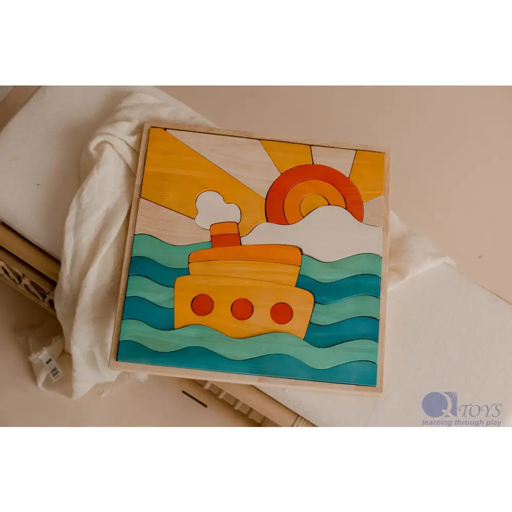 Colorful wooden puzzle depicting a boat on waves under a sun and clouds.