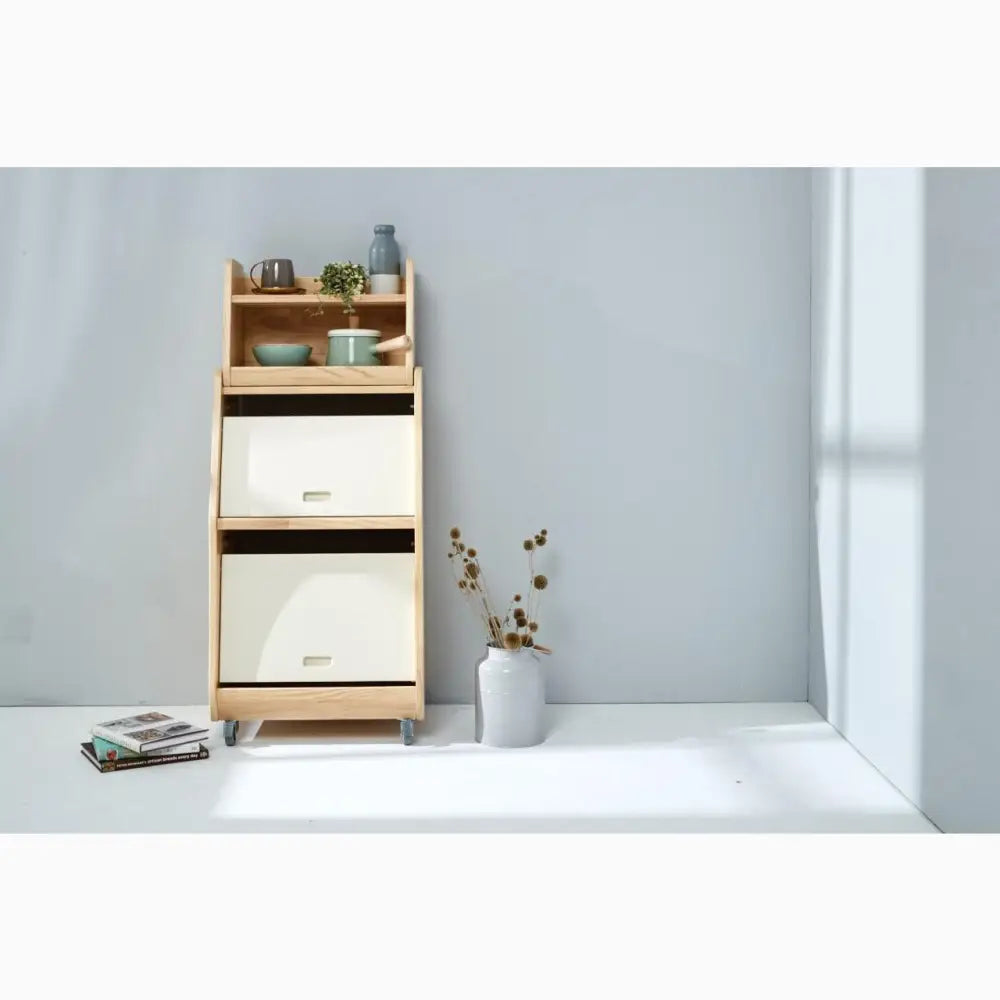 Wooden storage unit with open shelves and drawers.