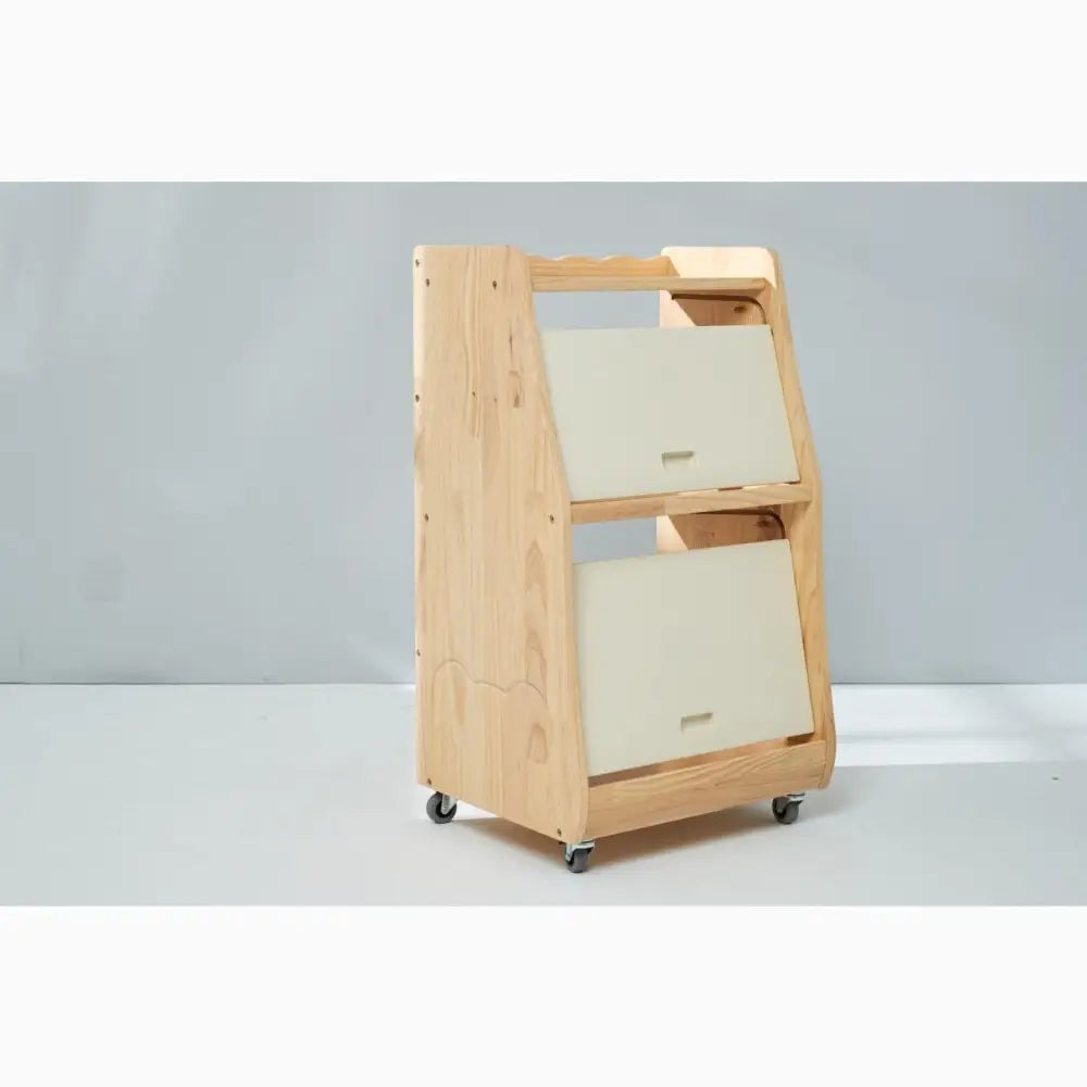 Wooden storage cart with two tilted compartments on wheels.