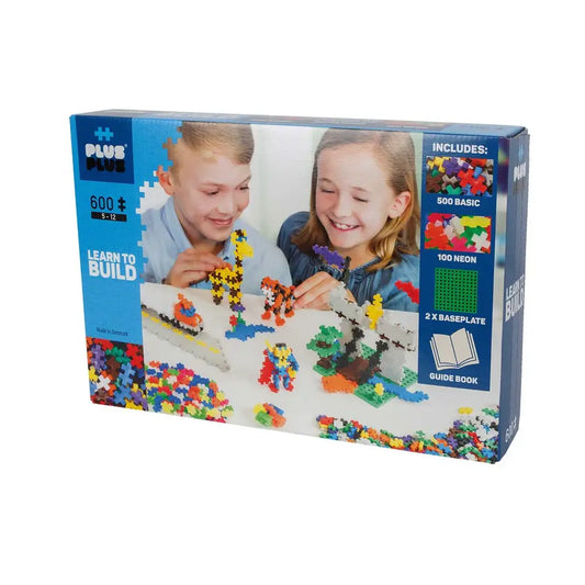 Colorful building block toy set with children playing on the packaging.