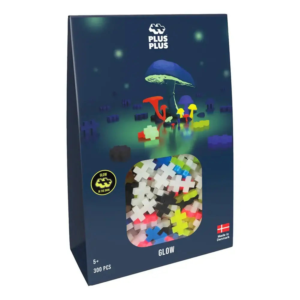 Box of colorful glow-in-the-dark building blocks featuring a mushroom scene on the packaging.