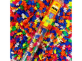 Colorful plastic tube filled with puzzle-shaped pieces.