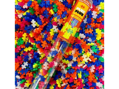 Colorful plastic tube filled with puzzle-shaped pieces.