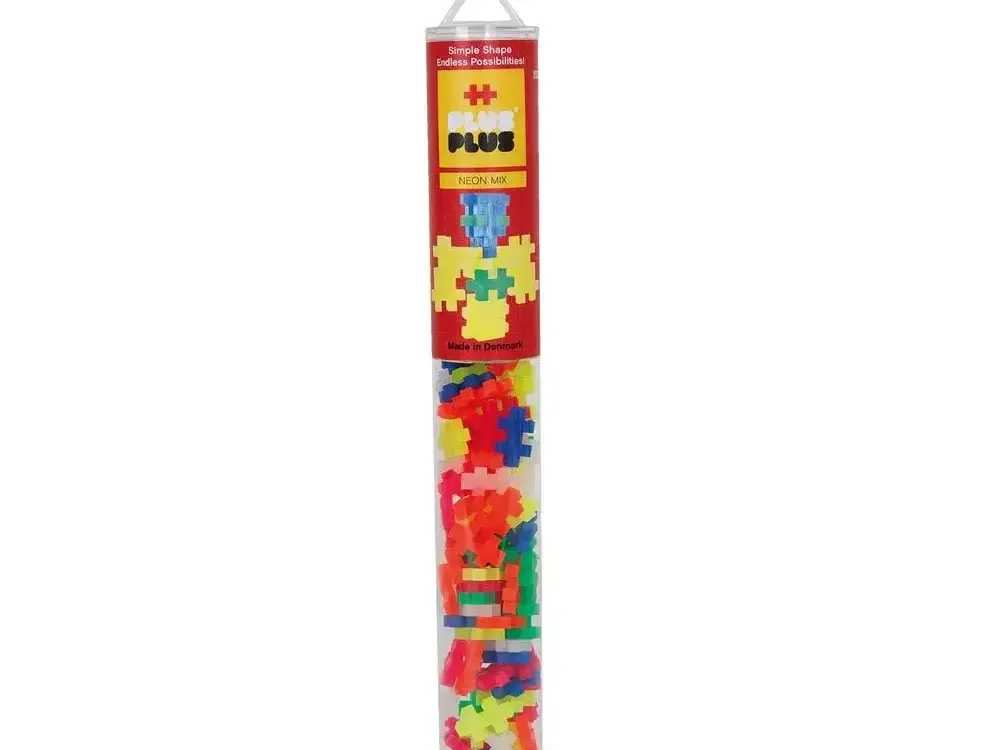 Cylindrical tube filled with colorful interlocking plastic building blocks.