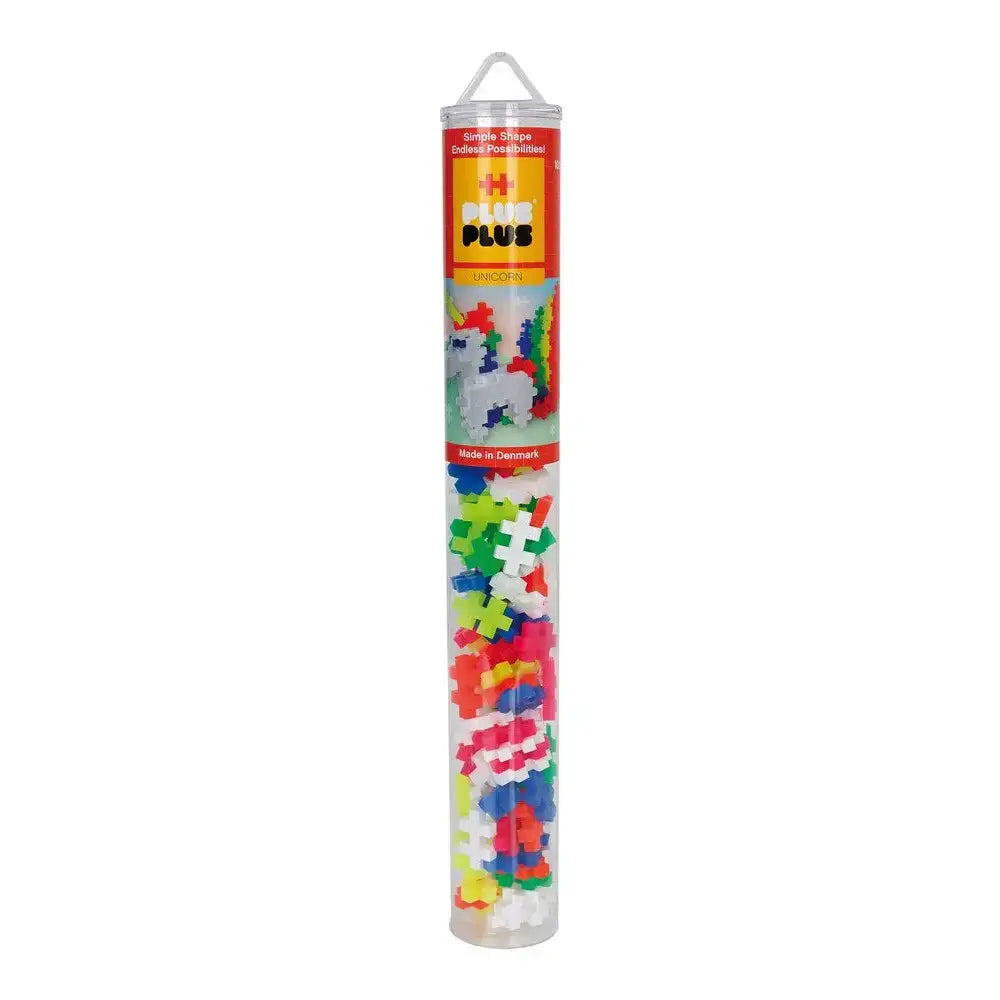 Clear plastic tube filled with colorful Plus-Plus building blocks.