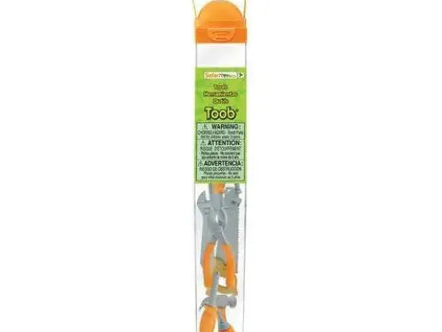 Plastic tube containing small toy animal figurines, labeled ’Toob’ on a green and orange packaging.