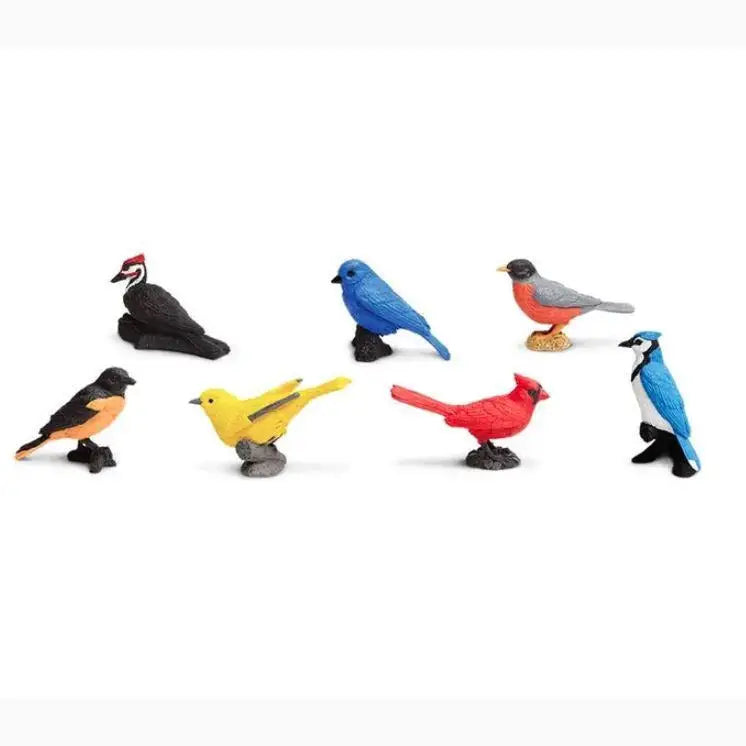 Collection of colorful toy bird figurines representing different species.