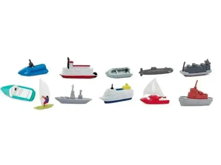Collection of miniature toy boats and watercraft in various styles and colors.