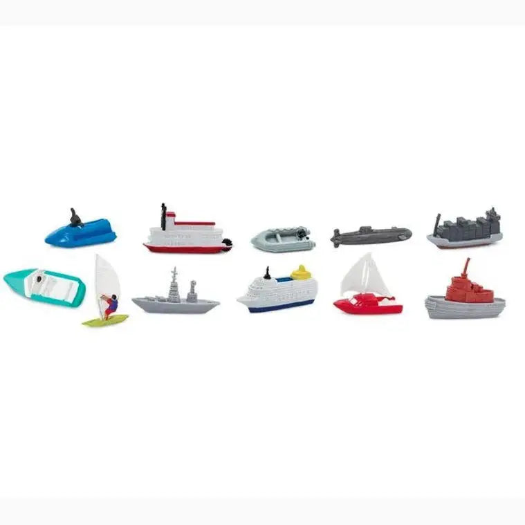 Collection of miniature toy boats and watercraft in various styles and colors.