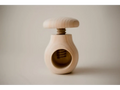 Wooden nutcracker with a round body and screw-top mechanism.