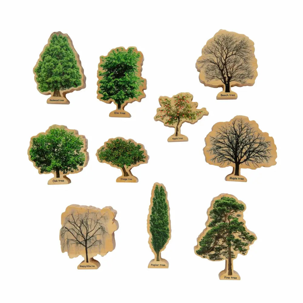 Collection of illustrated tree stickers or cutouts in various shapes and seasonal states.