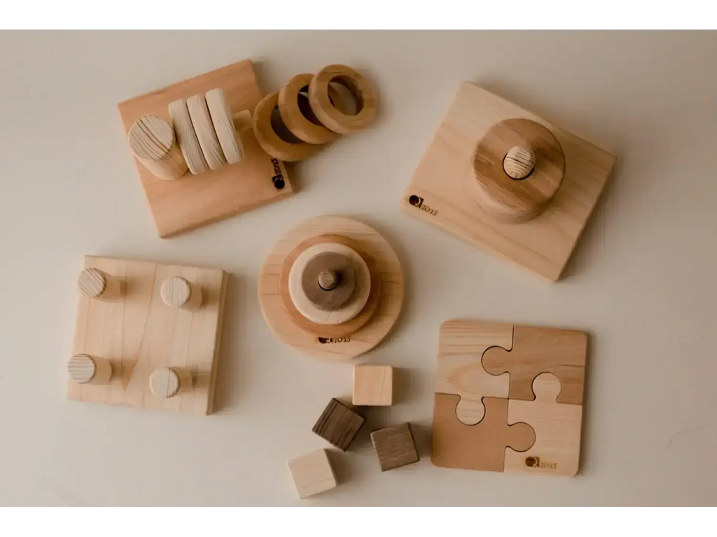 Collection of wooden toys and educational objects for children.