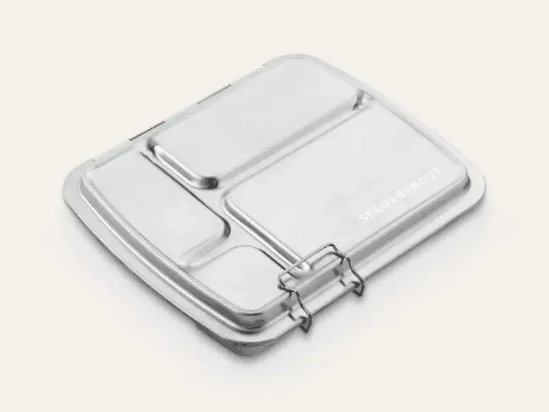 Compartmentalized metal lunchbox or food container with latches.