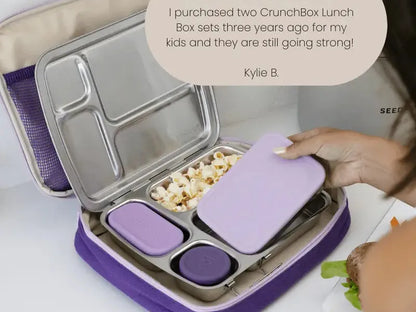 Purple and silver compartmentalized lunch box with multiple sections for food storage.