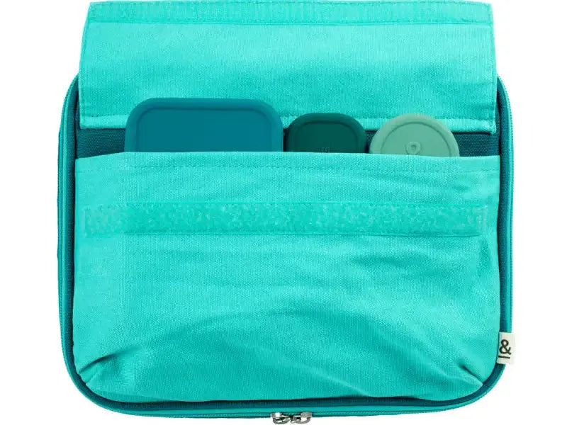 Turquoise fabric organizer or toiletry bag with compartments visible inside.