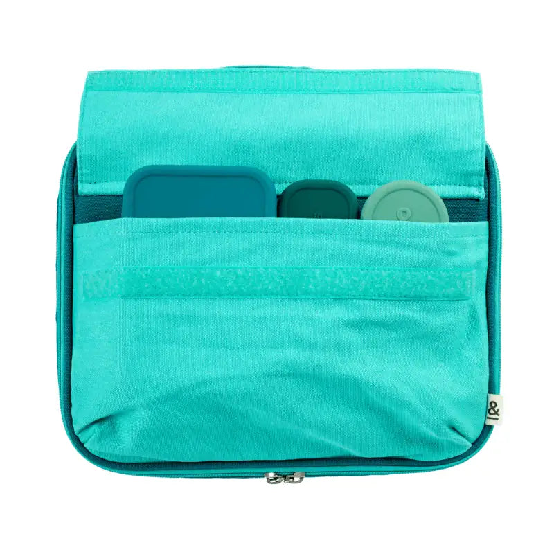 Turquoise fabric organizer or toiletry bag with compartments visible inside.