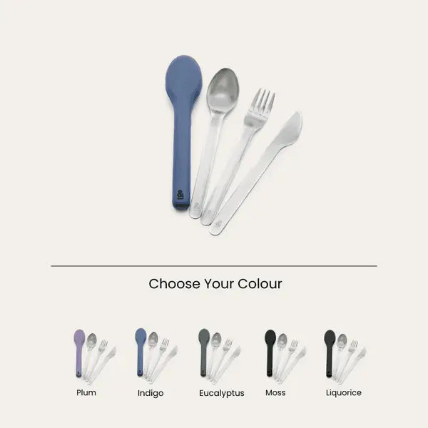 Cutlery set with colorful spoon.