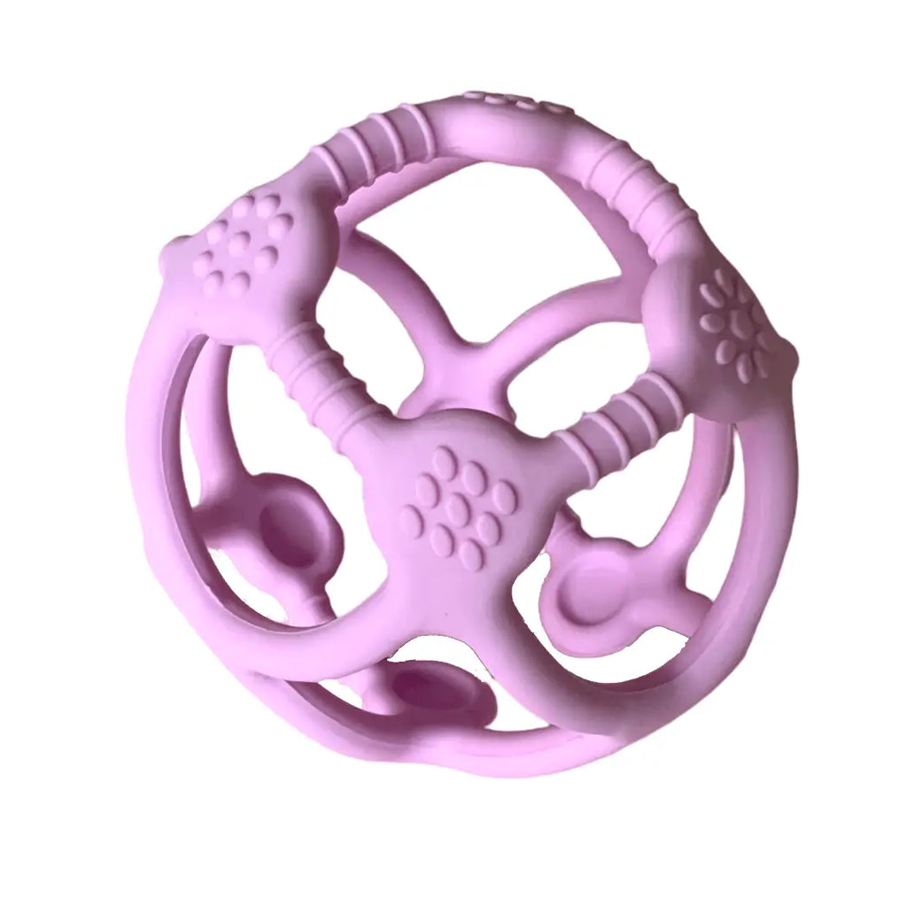 Pink spherical teething toy with various textured surfaces and openings.