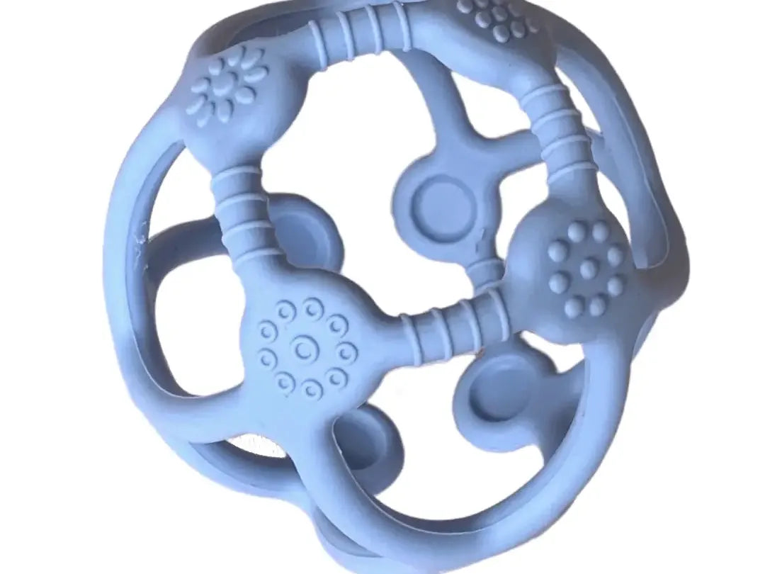 Blue teething toy with various textured surfaces and shapes.