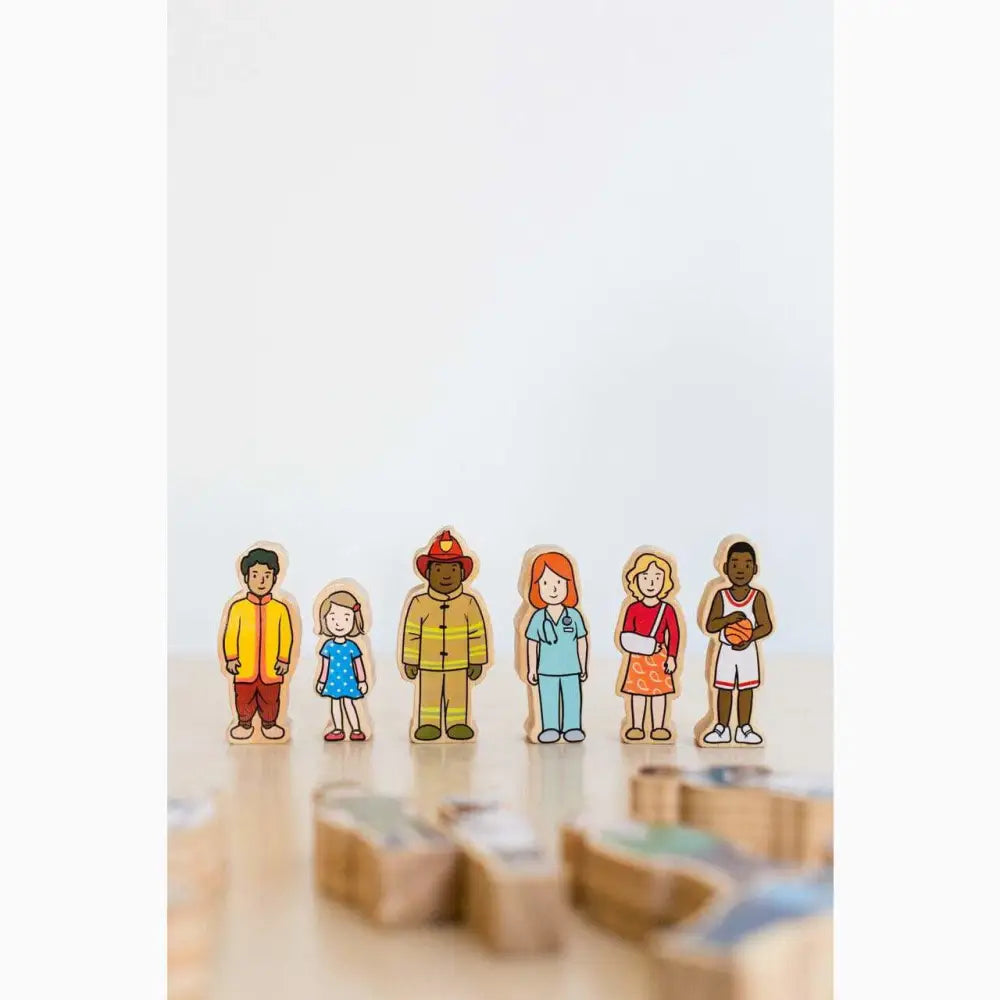 Six diverse wooden toy figures representing different occupations and ethnicities.