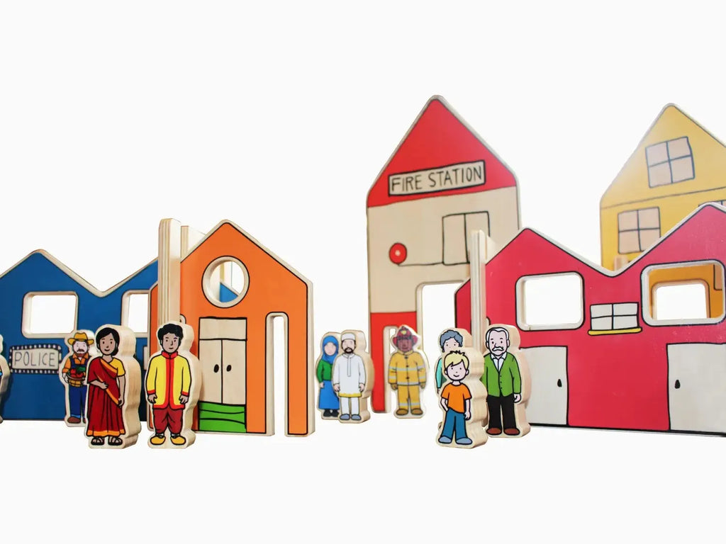 Colorful wooden toy town set with buildings and figurines.