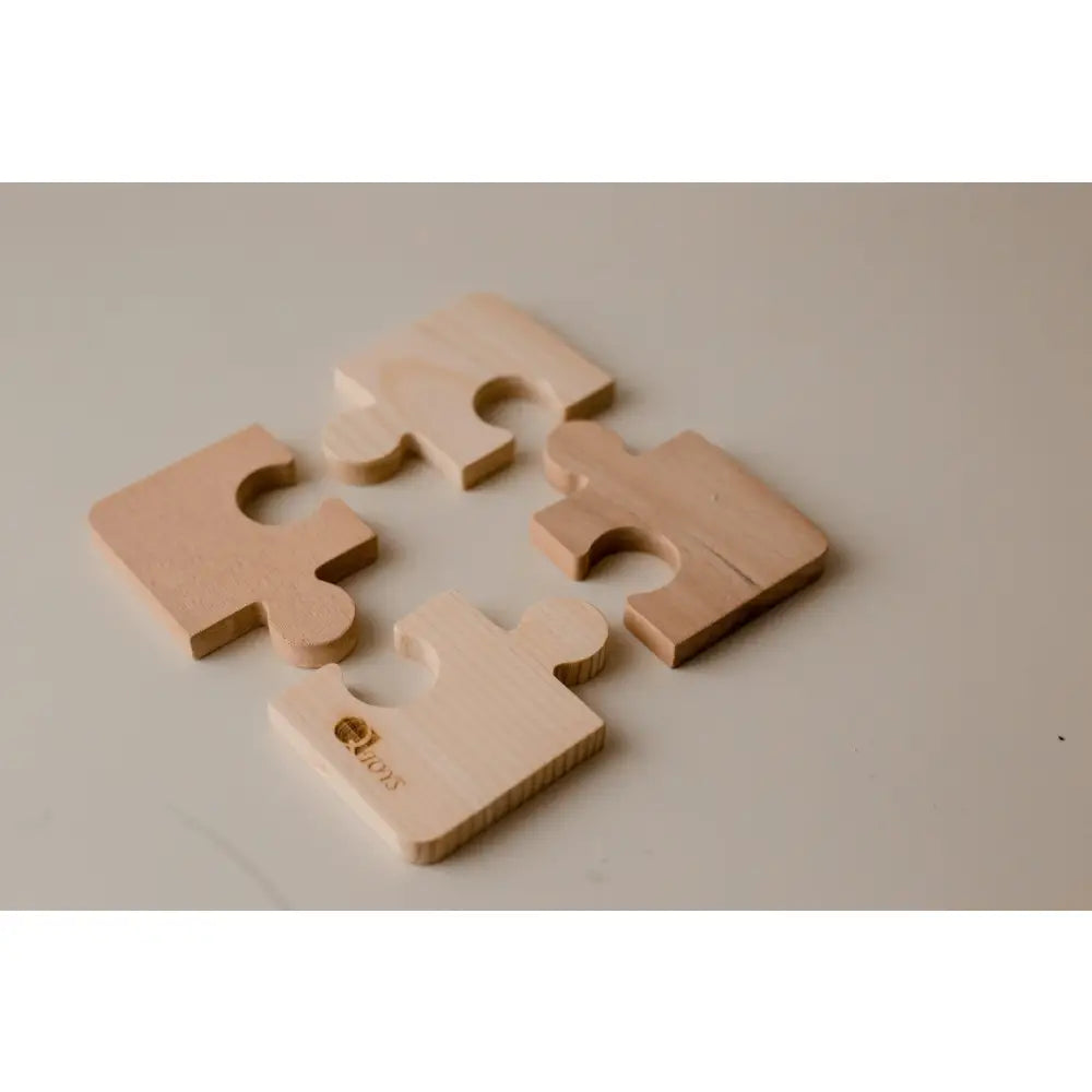 Puzzle pieces in a beige or light tan color.