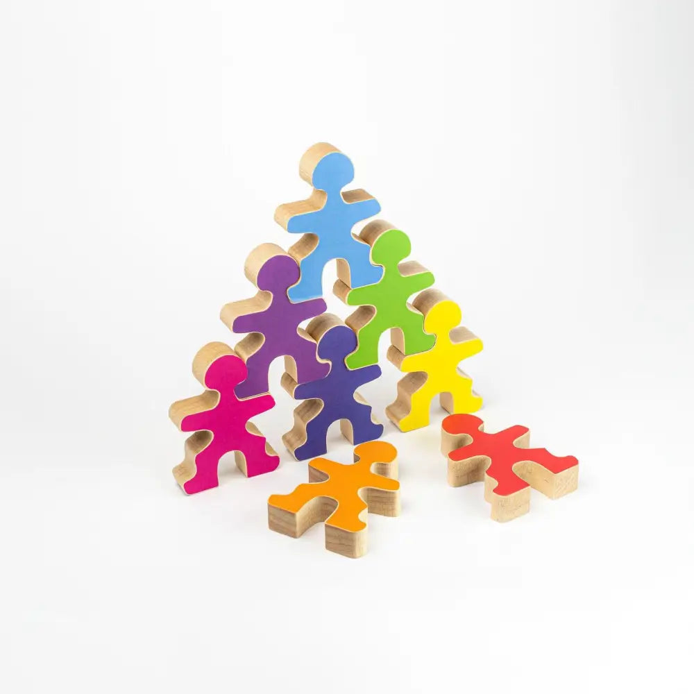 Colorful wooden figures arranged in a pyramid-like formation.