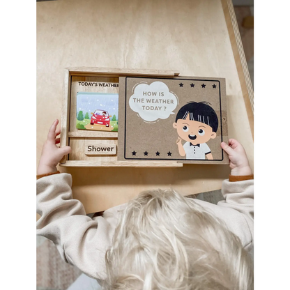 Weather and mood board for children with sliding panels and cartoon illustrations.
