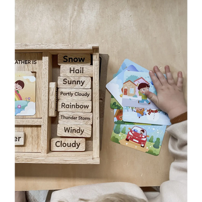 Wooden weather board with interchangeable weather condition labels and illustrated cards.