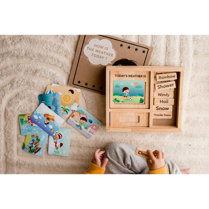 Wooden weather learning toy with interchangeable cards and a display board.